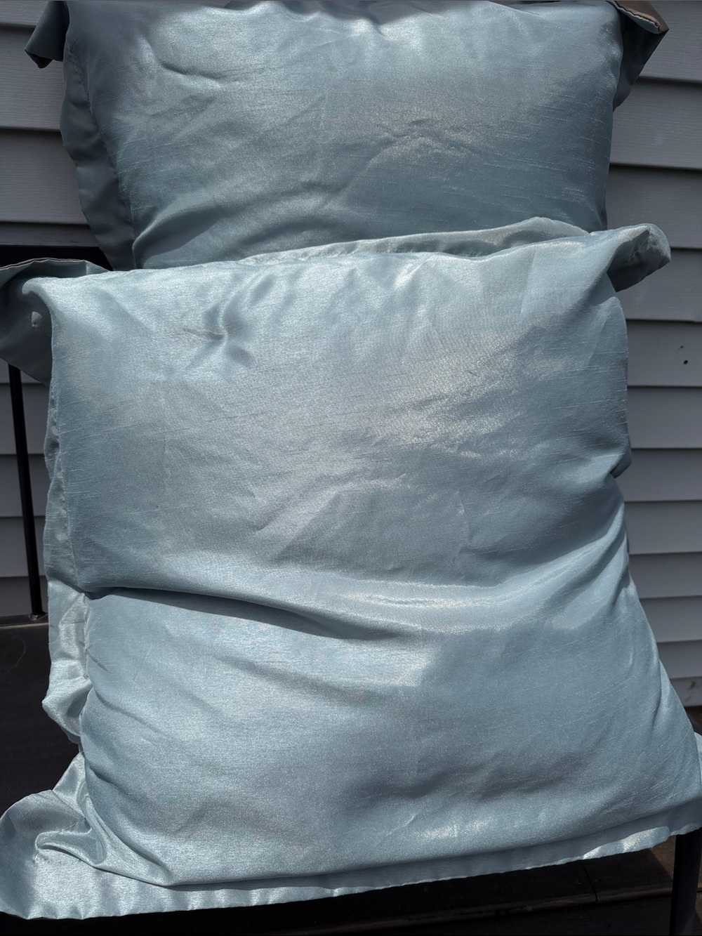 2 Pillows in Turquoise up Shine Cases brown button